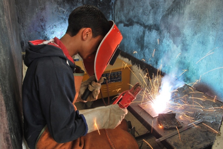 A student does arc welding. Afghanistan